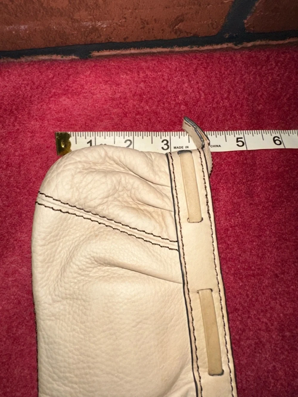 Cream Leather Wristlet Clutch with Gold Medallion Accent